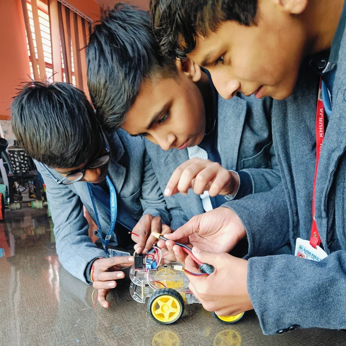 Student Innovation Showcase students learning through hands-on robotics